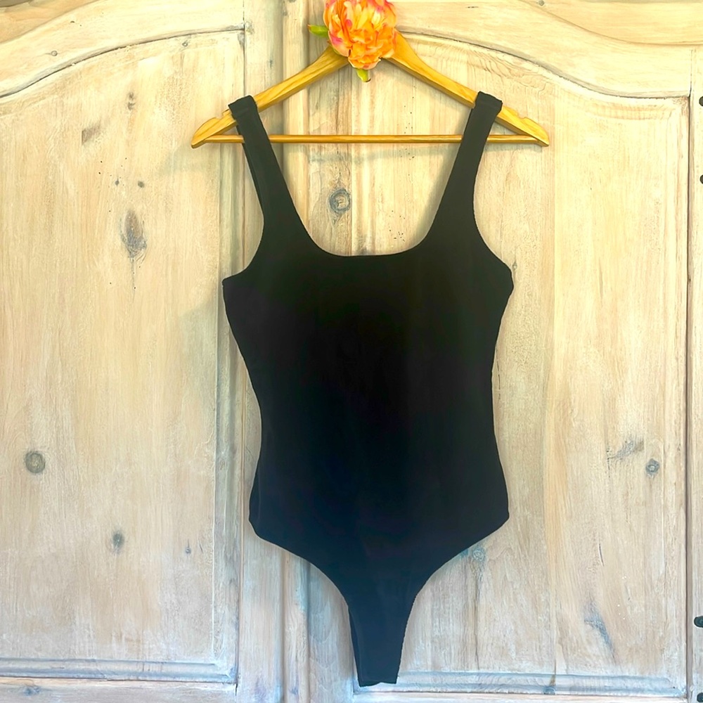 Soft body suit from Nordstrom. Never been worn only washed